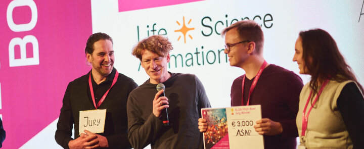 Four people on stage at ELSA Pitch Bowl 2024 - winner ASAP receives award certificate worth €3,000.